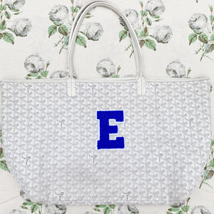 small "E" patch